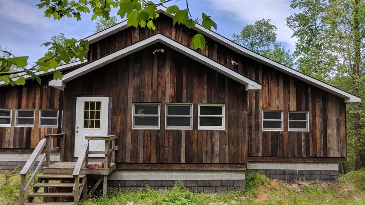 The front entrance of the reconstructed barn and studio