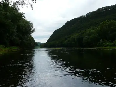 The Potomac River flowing between wooded ridges