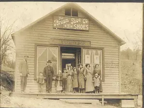 Townspeople in front of the store, circa 1910