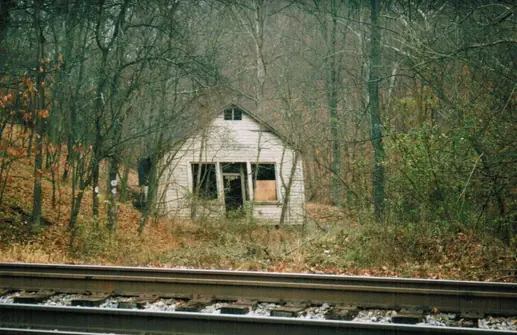 The store building beside the tracks in the 1970s
