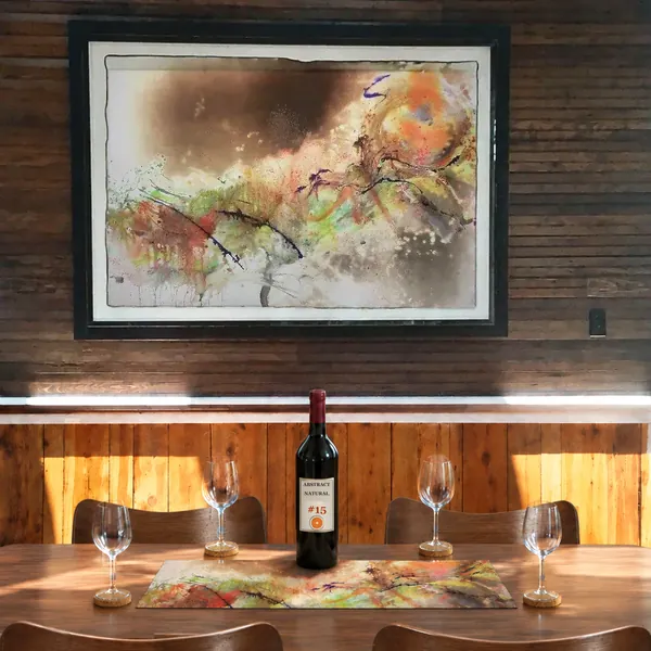 Serving suggestion. the dining table under the framed abstract painting, with cream chairs on both sides, photo 31 of 32