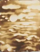 Sepia firepainting of rippling water under a pale sun, as shown in the article